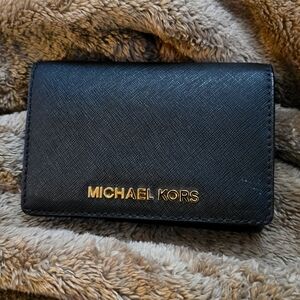 Small wallet michael kors,black used ones